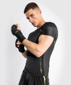 Venum Tempest 2.0 Rashguard - Short Sleeves - MMA Factory -Sports - Boxing 99e6578e2a4119fae29069887ba1f3fd9f092947 rashguards ss tempest2.0 black gold 01 1