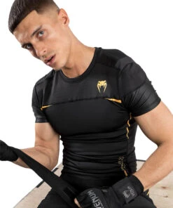 Venum Tempest 2.0 Rashguard - Short Sleeves - MMA Factory -Sports - Boxing a3ed9a46c01aa5a5cb77b5dd5f3826325bebac17 rashguards ss tempest2.0 black gold 06 1.5